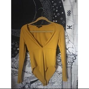 Yellow deep v body suit